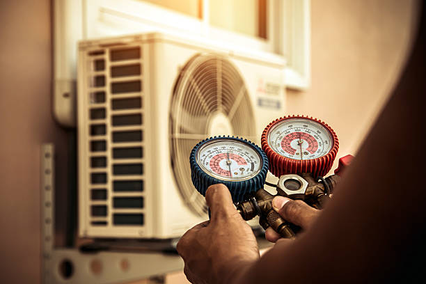 Professional Hvac technician working in Essington, PA